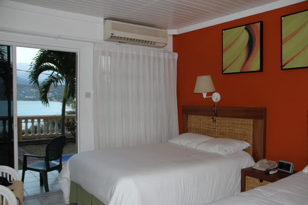 Zimmer mit Terrasse und Blick aufs Meer Hotel The Flamboyant