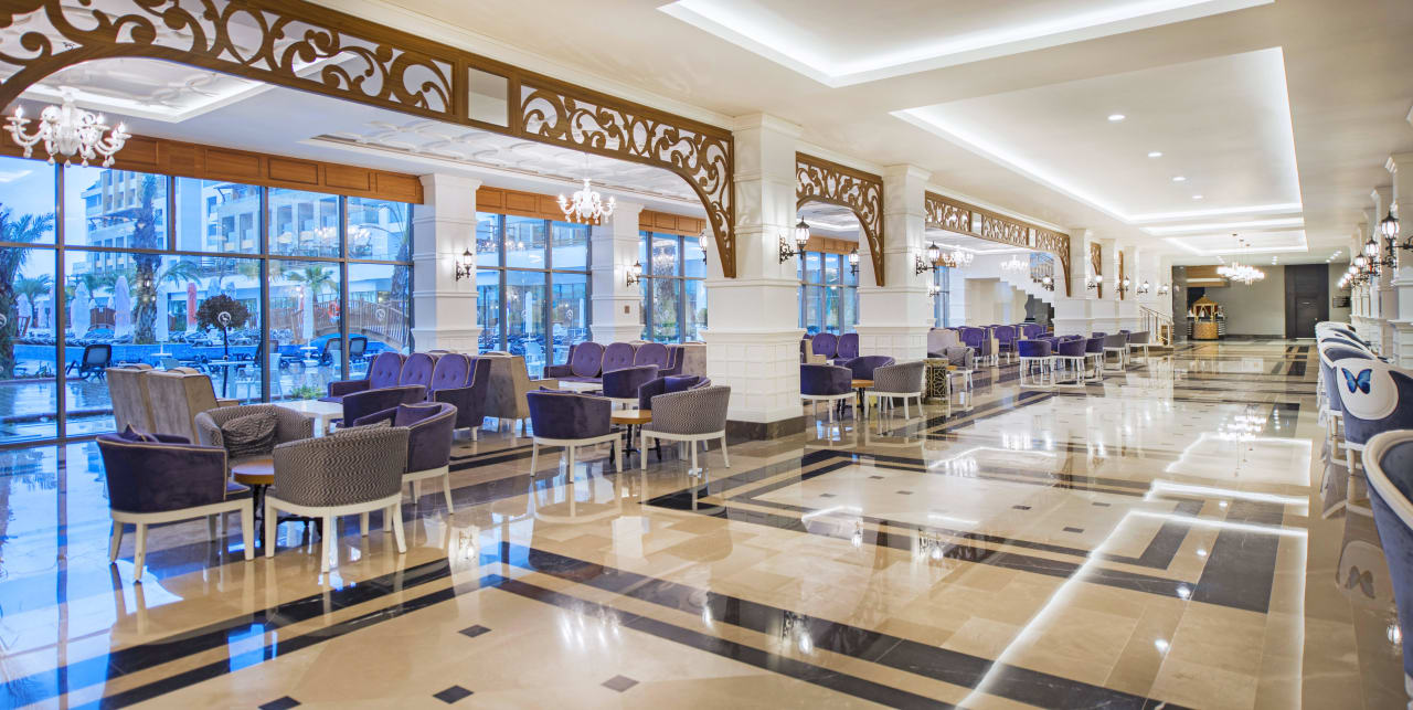 LOBBY HALL NEAR LOUNGE BAR Port Nature Luxury Resort & Spa