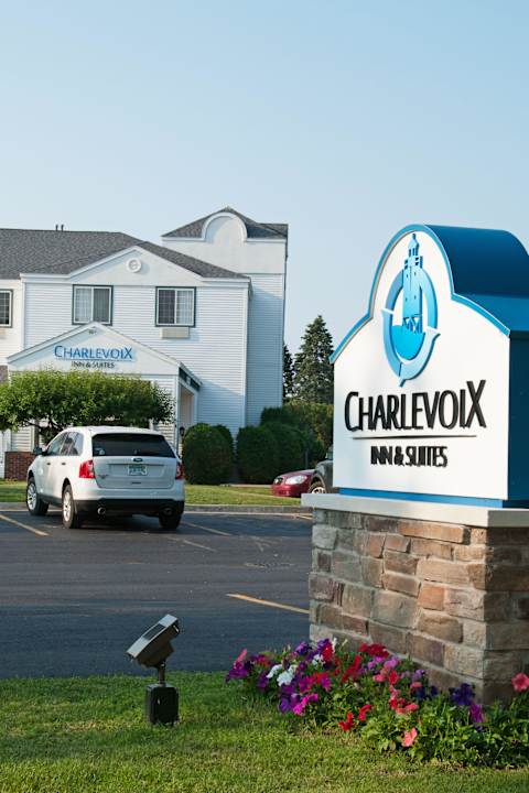 Hotel Parking Lot and Entrance Charlevoix Inn & Suites, SureStay Collection by Best Western