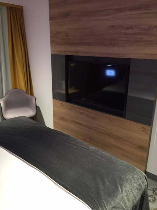 Tv w pokoju Hotel Puro