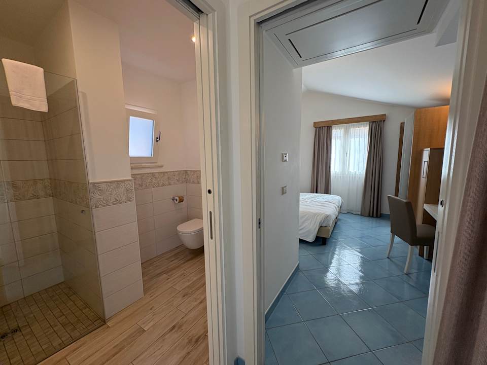 Zimmer Baia Del Godano Resort & Spa