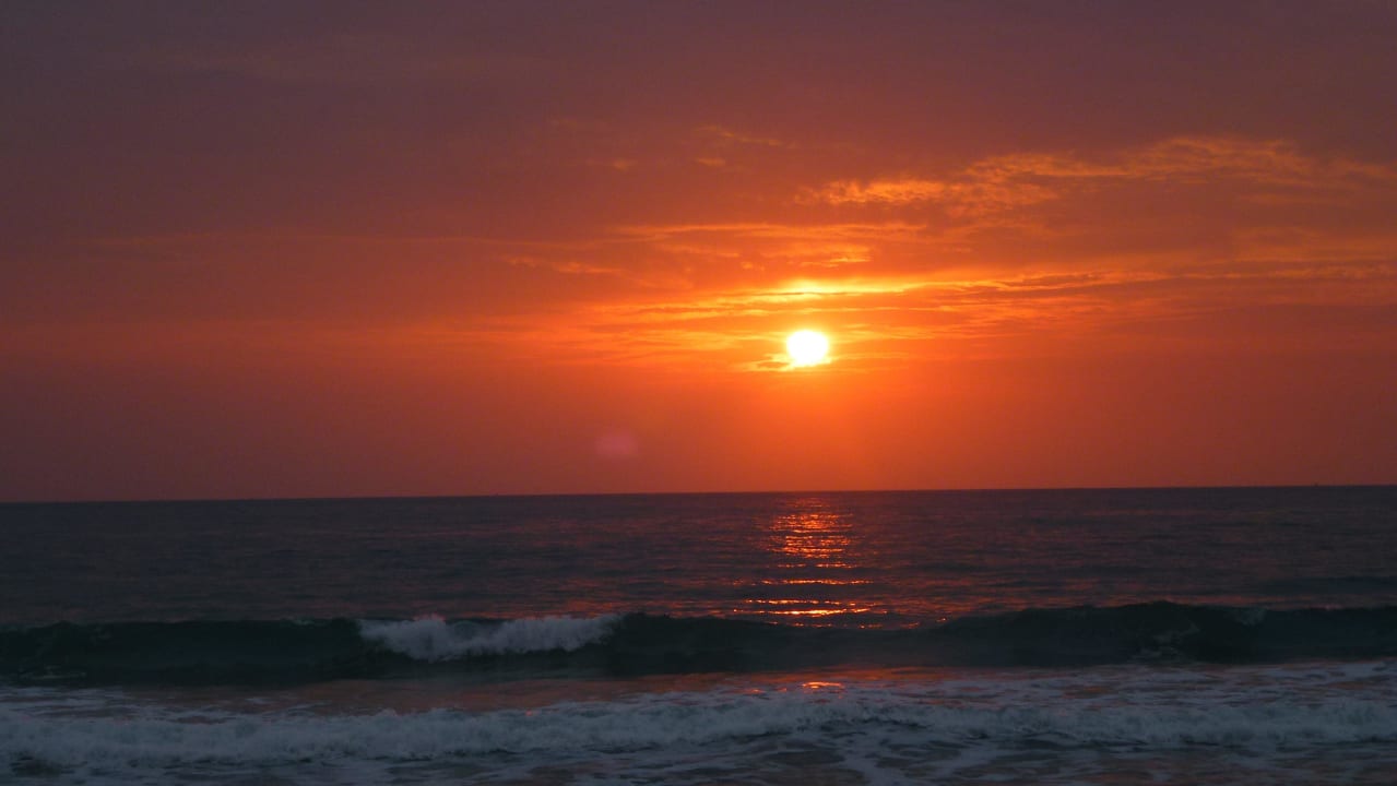 Sonnenaufgang The Fair House Beach Resort