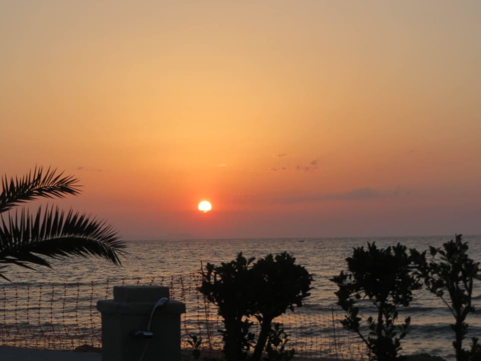 Sonnenuntergang vom Balkoon aus Cressida Seaside Apartments
