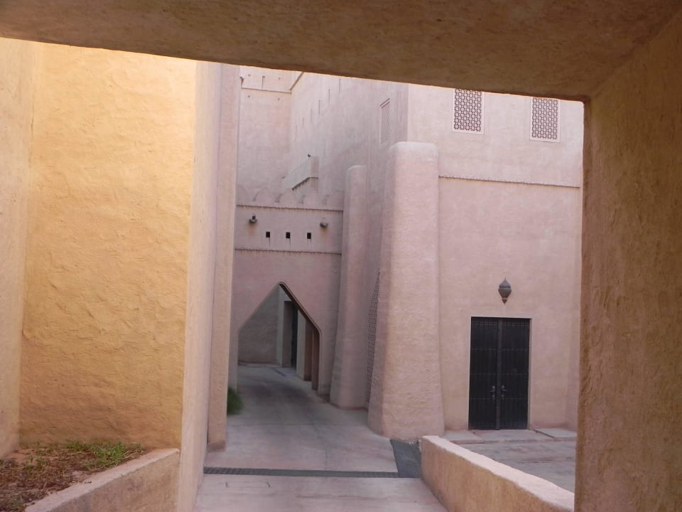 Walkway to breakfast Qasr Al Sarab Desert Resort by Anantara