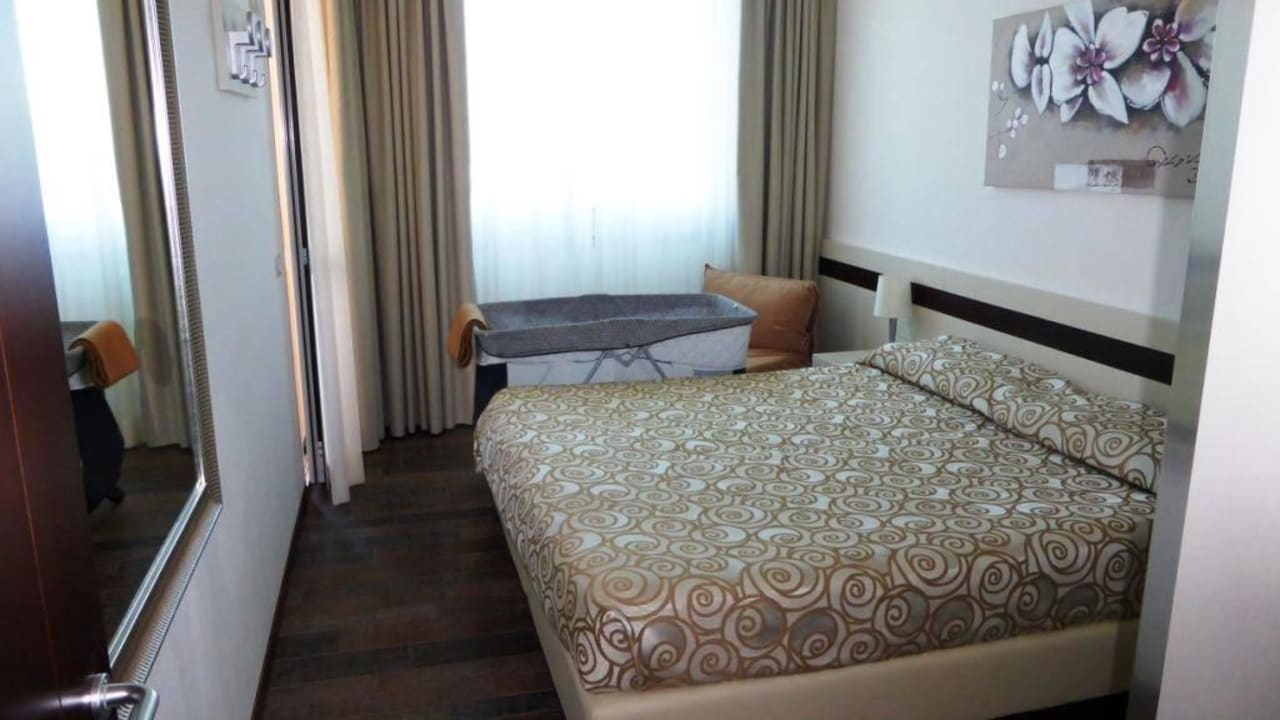 Schlafzimmer zum Apartment 607 Aparthotel Holiday