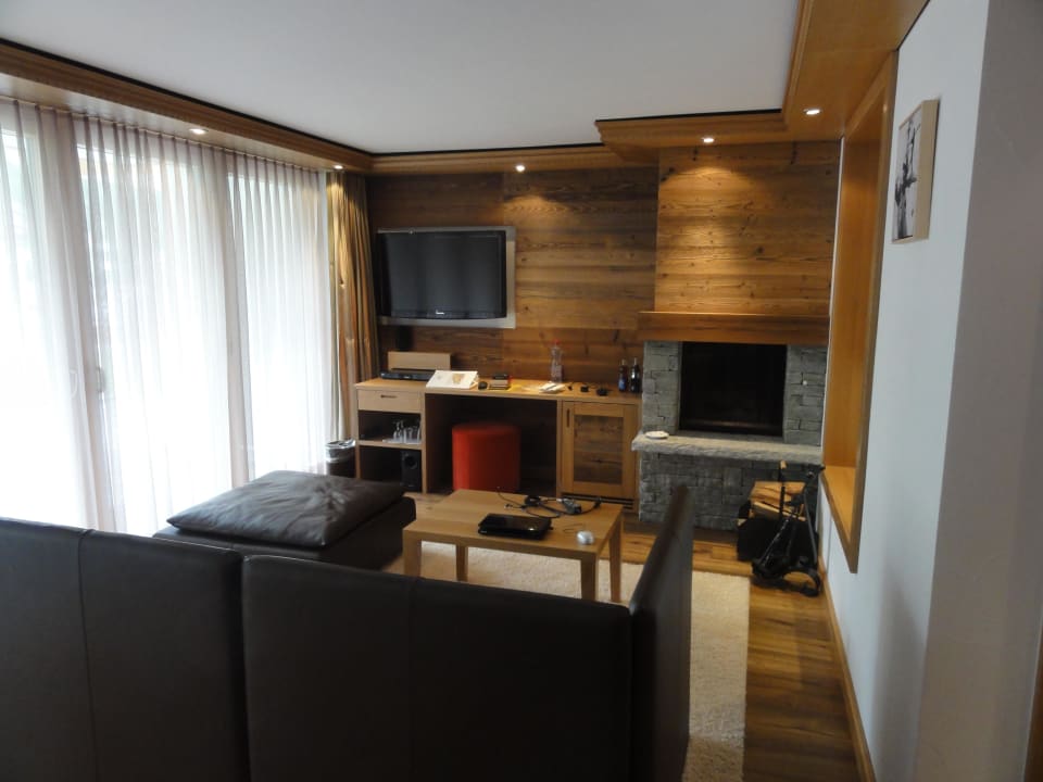 Wohnzimmer mit Kamin Relais & Chateaux Schönegg