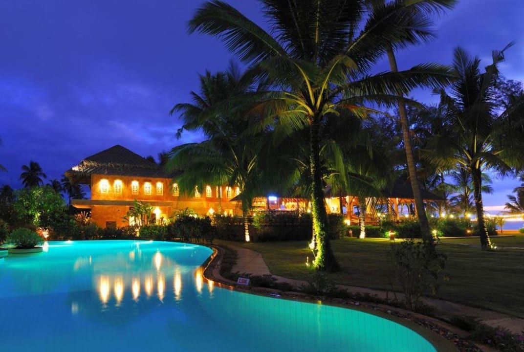 Pool at night The Andamania Beach Resort & Spa