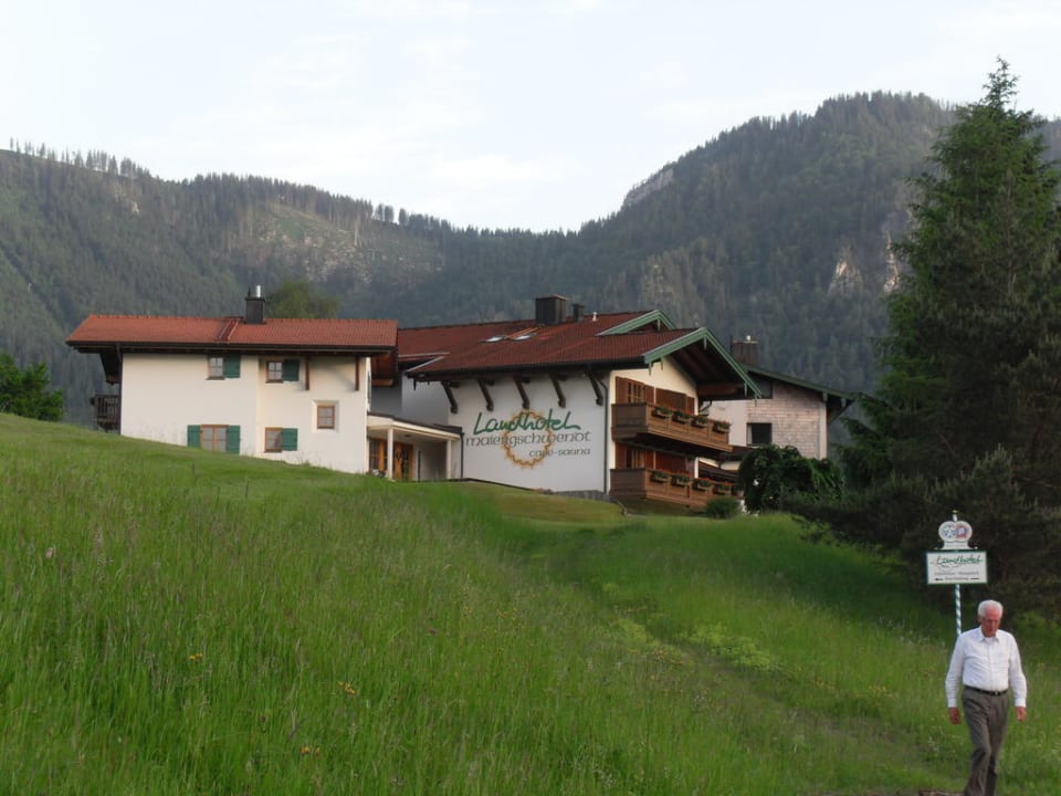 Maiergschwendt with mountains in background Landhotel Maiergschwendt
