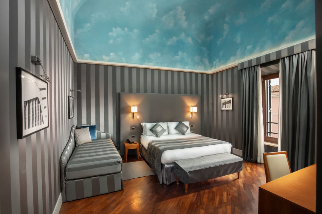 Zimmer Monti Palace Hotel