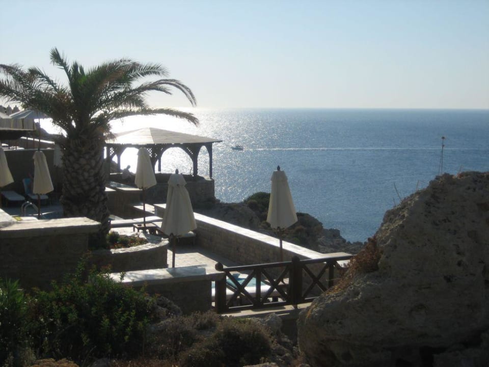 Sonnenaufgang am Pool Hotel Kalithea Horizon Royal