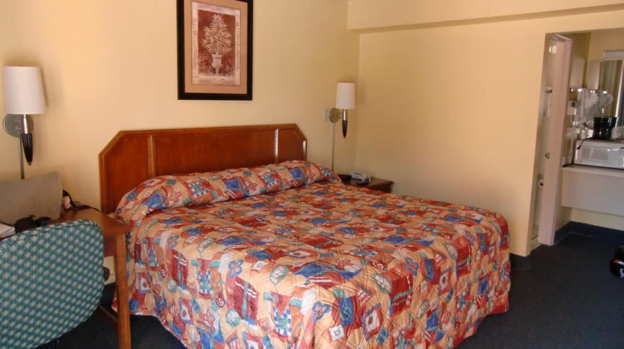 Blick aufs Bett Hotel Bella Oasis Inn & Spa