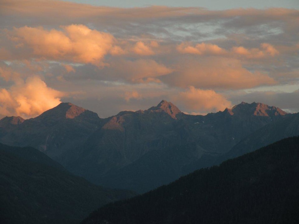 Sonnenuntergang über den Alpen Hotel Belmont