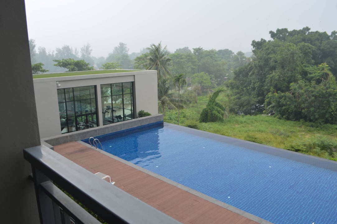 Pool (and gym in the back)  - seen from balcony Sugar Palm Residence
