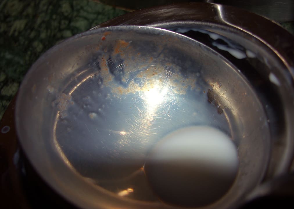 Dreckige Schöpfkelle zum Milch holen Aska Bayview Resort