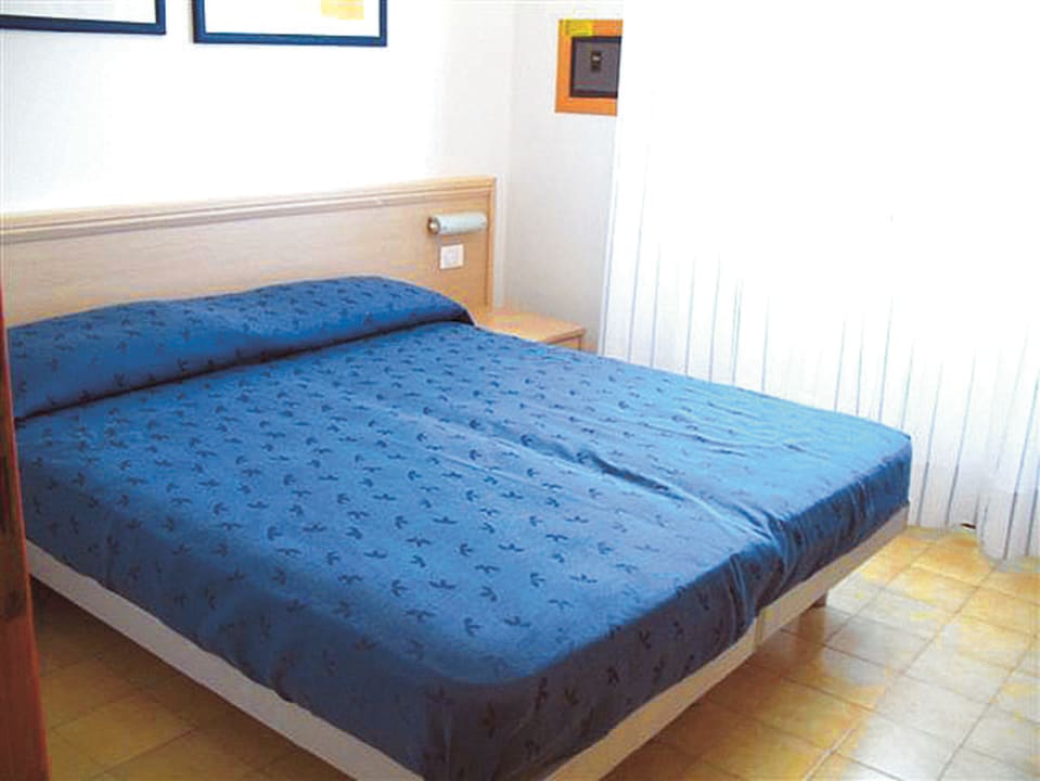 Schlafzimmer Hotel Dei Gelsomini Villaggio