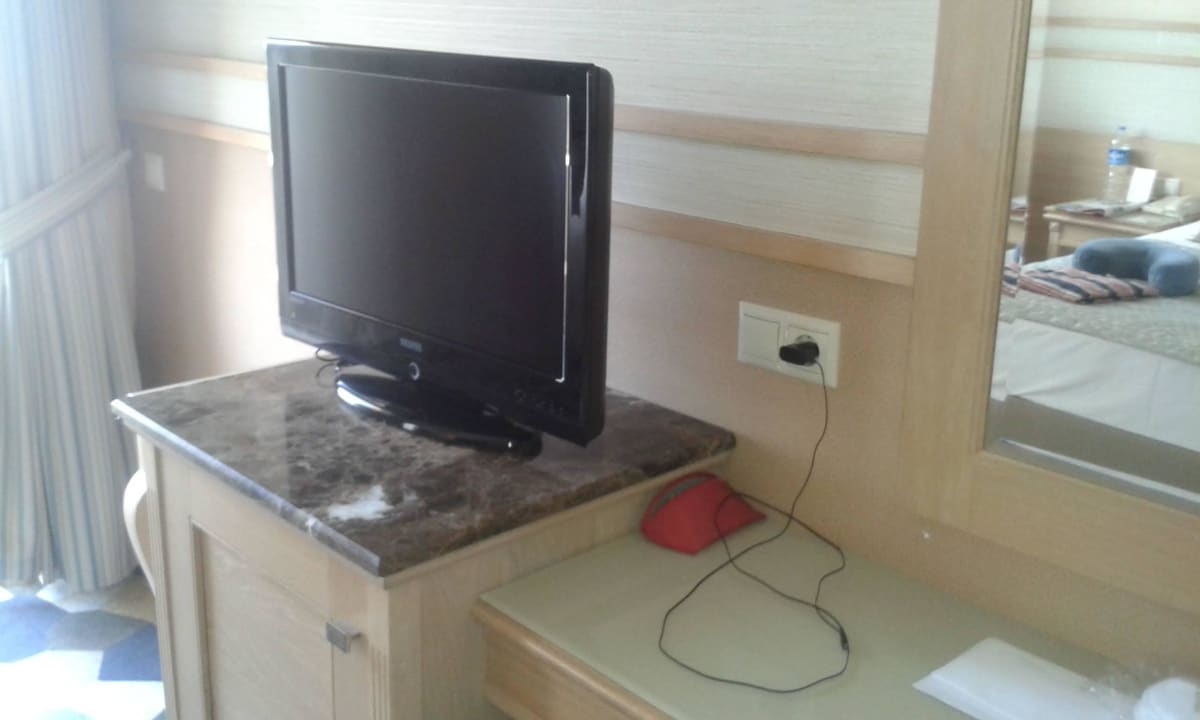 Flachbildschirm Fame Residence Lara & Spa