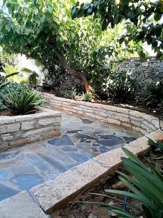 Gartenanlage HARPIN Happy Days Beach Hotel