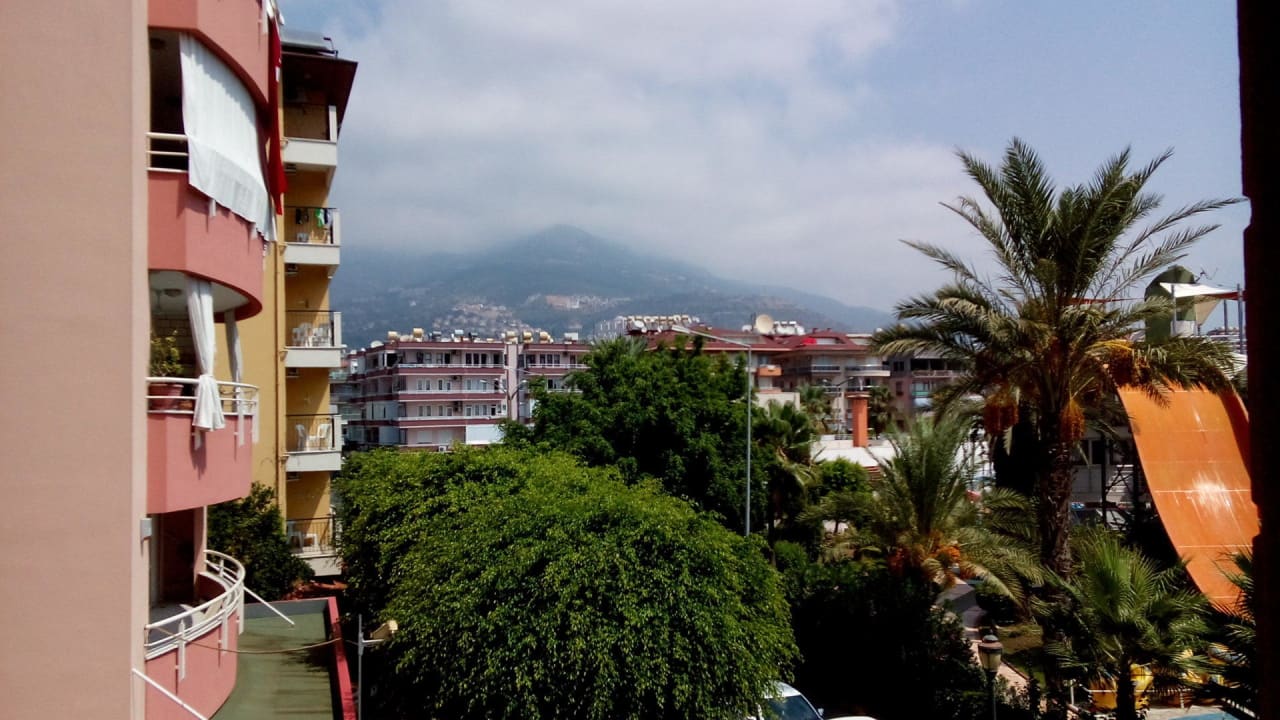 Вид с номера на горы  Hotel Aslan City Kleopatra