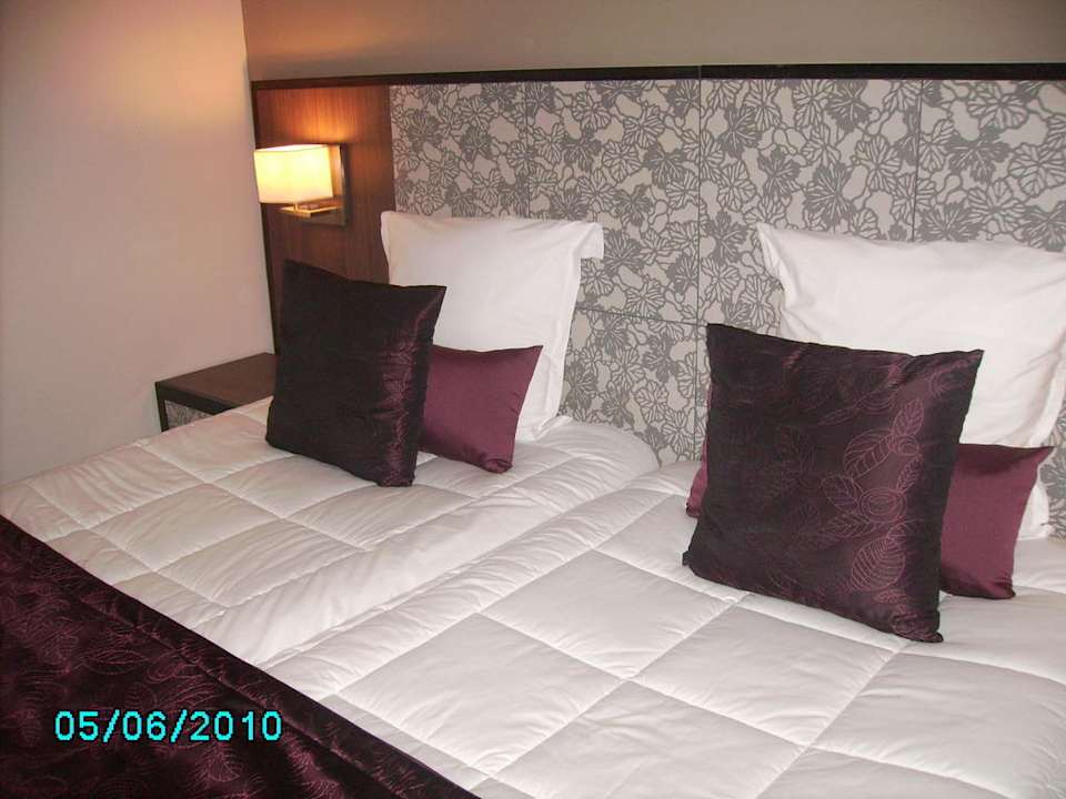 Gemütliches Bett Hotel Rosa Beach