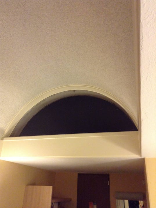 Skylight full of webs there are 2 this is one  Howard Johnson Inn & Suites Orange