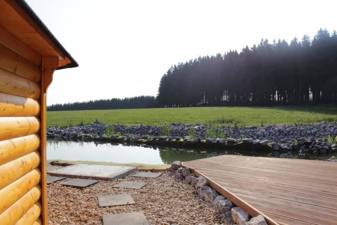 Naturschwimmteich Naturstammhaus und Appartements Zum Brockenbaecker