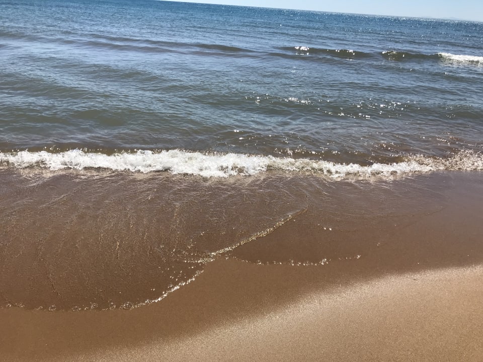 Strand Club Grand Side