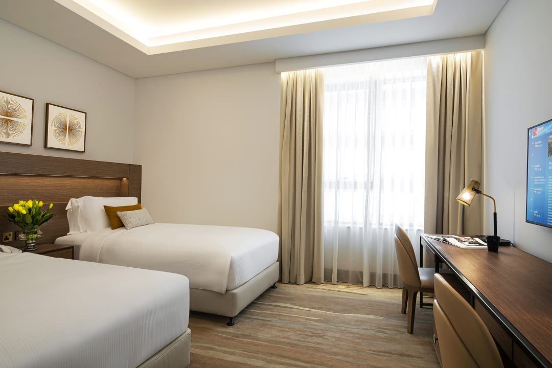 Zimmer Al Jaddaf Rotana Suite Hotel