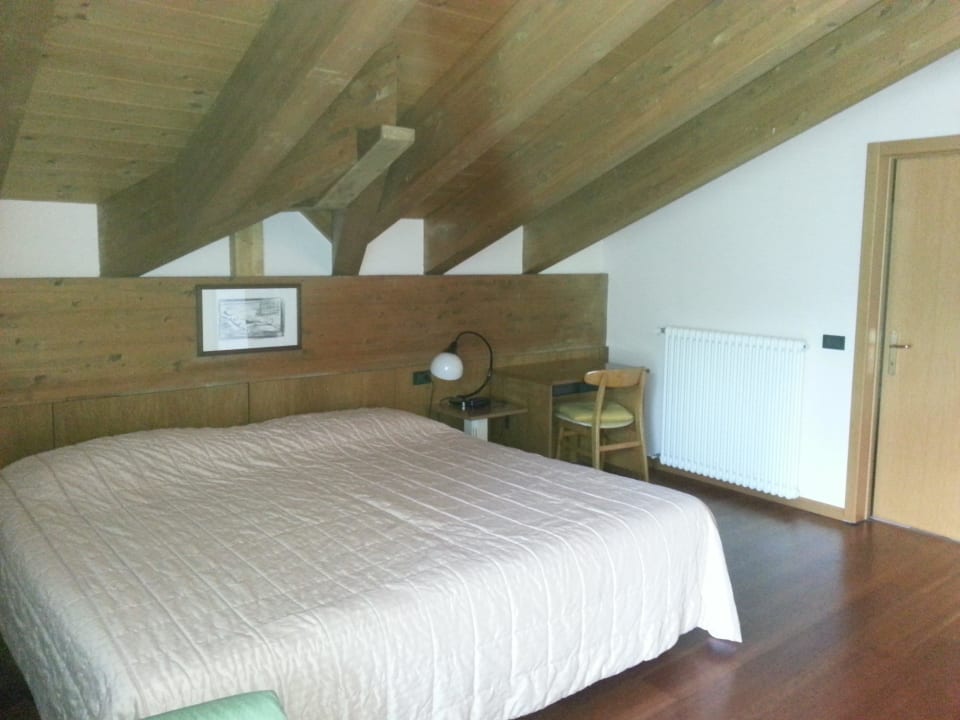 1 Schlafzimmer der Suite Club Hotel Lago di Tenno