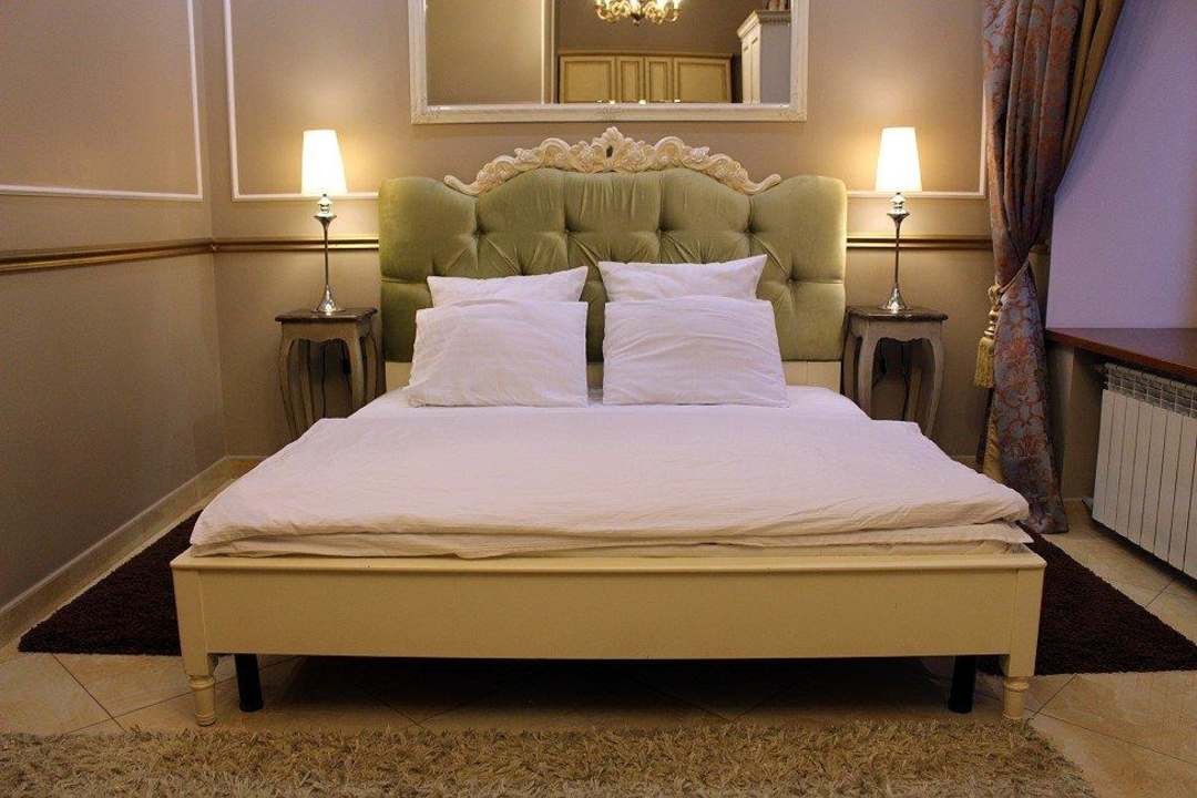 Bett im Luxury Studio Apartment Apart-Hotel Theatre