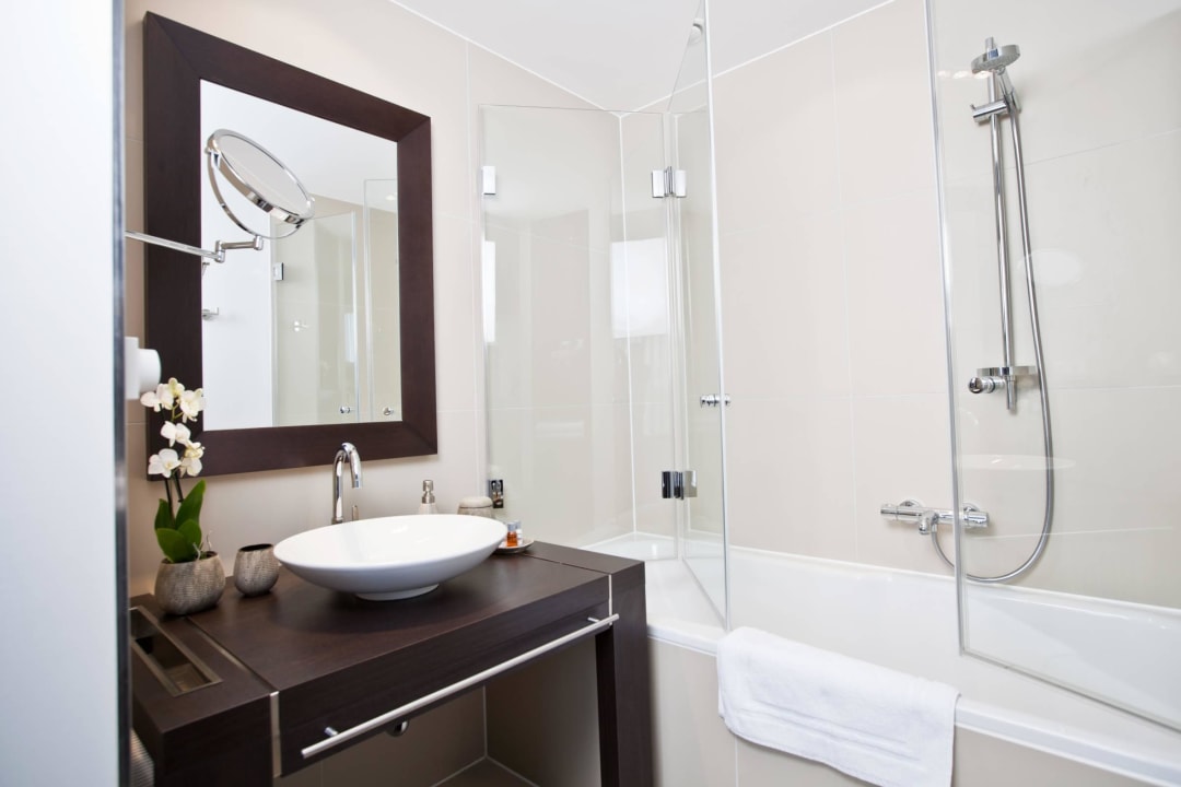 Bad mit Wanne Goodman's Living Apartments