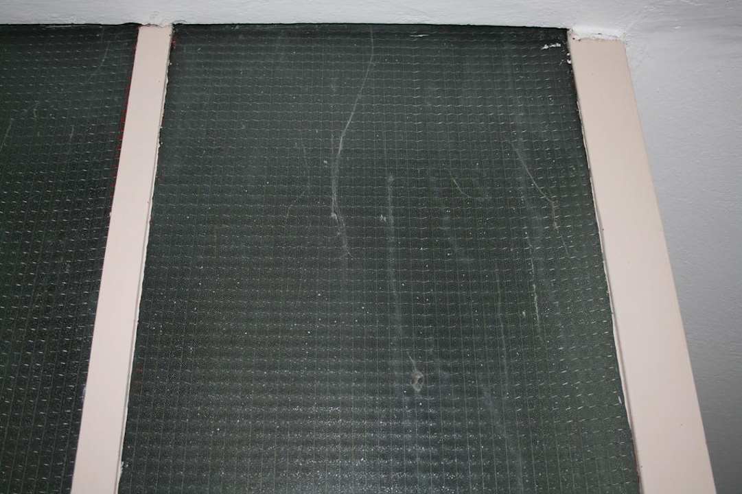 Fensterscheibe im Treppenhaus Rivijera Villen & Dependance Flora & Madera