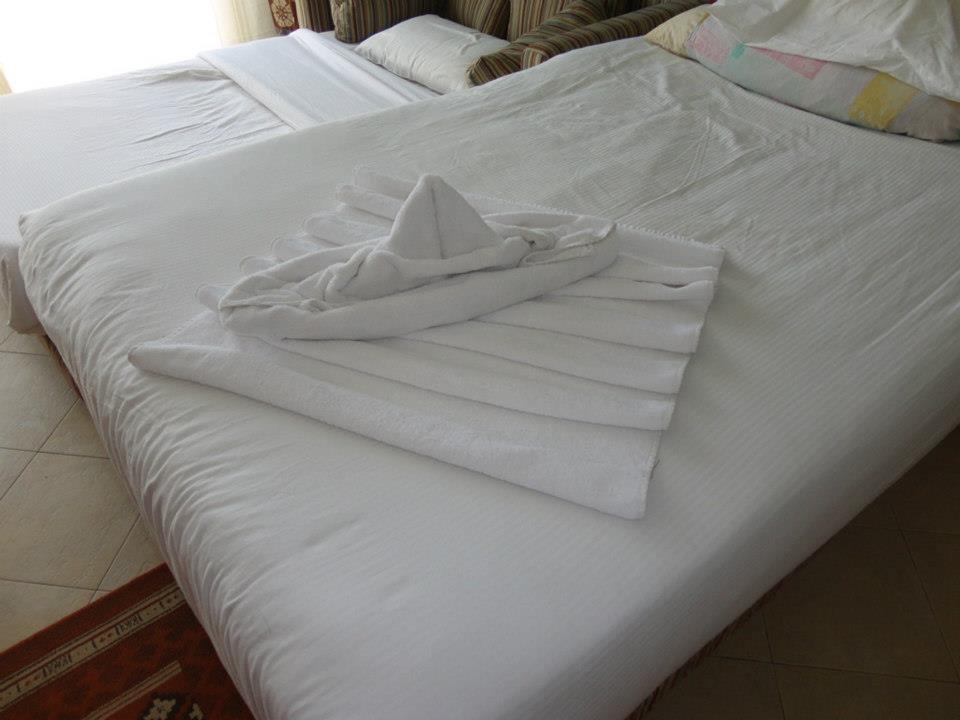 Handtuchmotive am Bett Titanic Beach Spa & Aqua Park