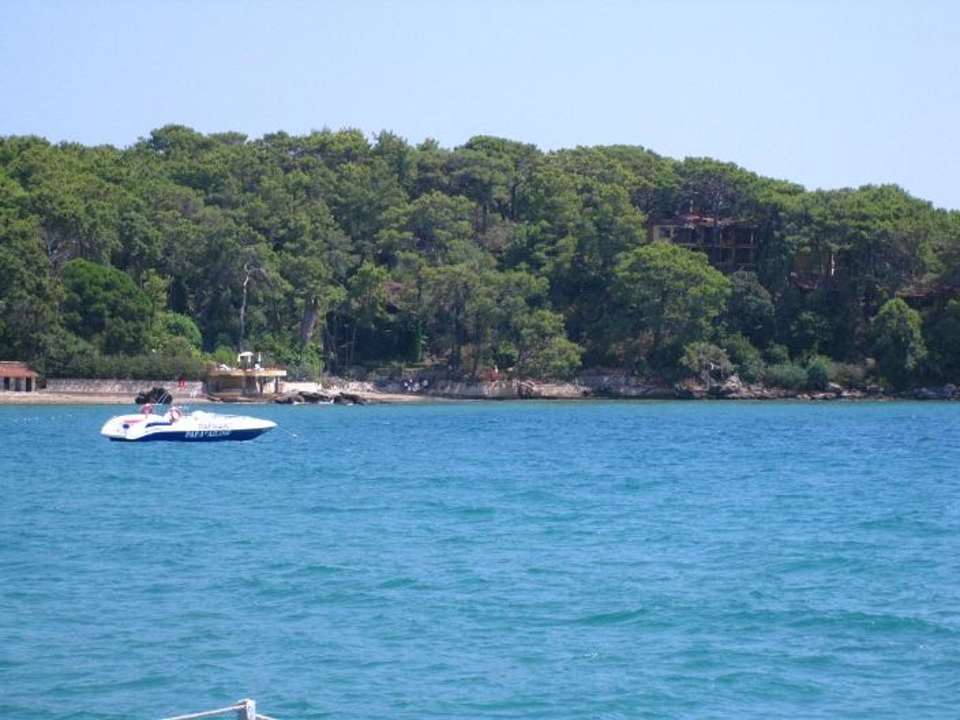 Das türkisfarbene Wasser, ein Foto vom Steg Top Hotel