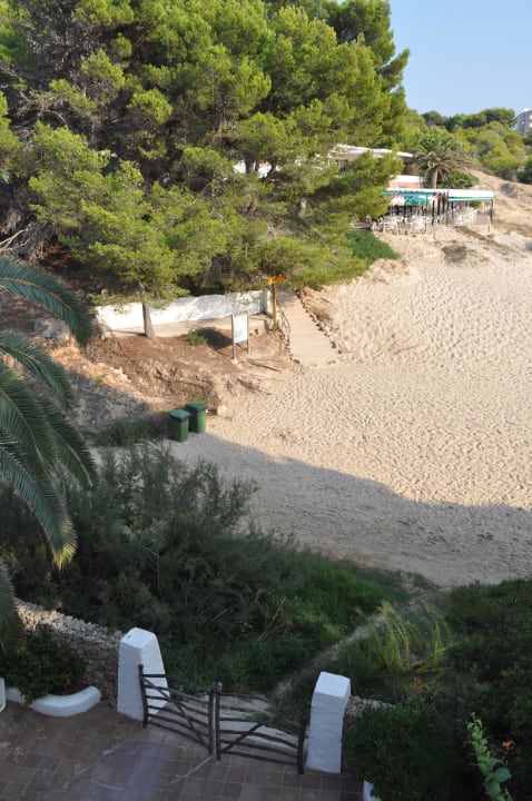 Entrada al edificio desde la playa Apartamentos Jardin Playa