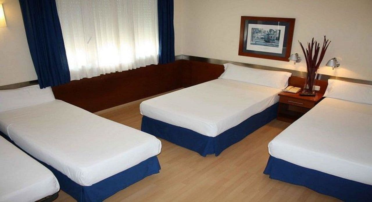 Habitación Familiar Hotel Tres Torres Atiram