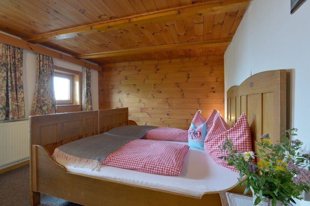 Ein Schlafzimmer - Ferienhaus Lenzelerhof Ferienhaus Lenzelerhof
