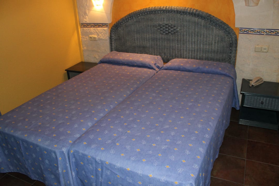 Bett im Zimmer Park Club Europe