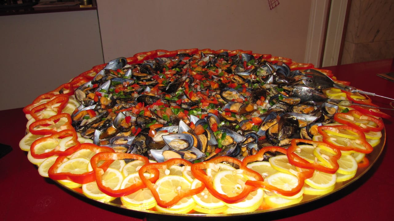 ... lecker zubereitete Muscheln Hotel & Spa S'Entrador Playa