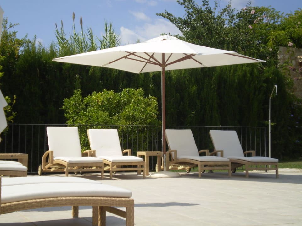 Sonnenliegen am Pool Hort de Cas Missèr