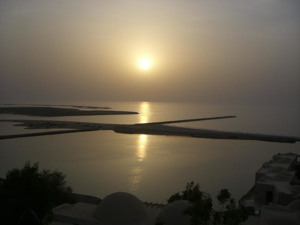 Sonnenuntergang The Cove Rotana Resort