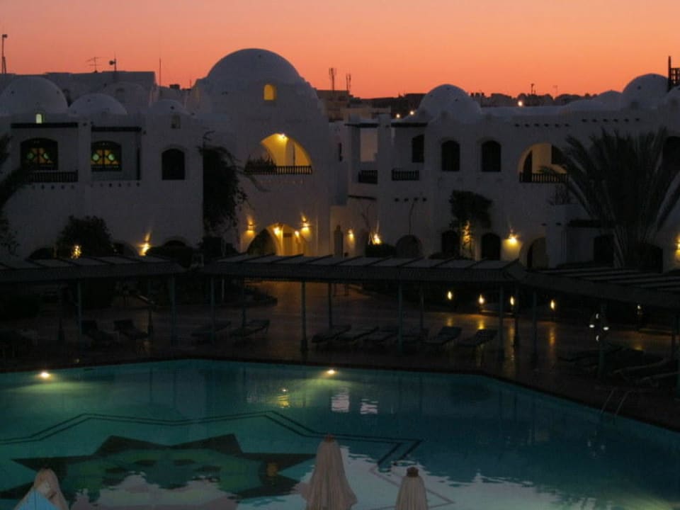 Pool by night Arabella Azur Resort