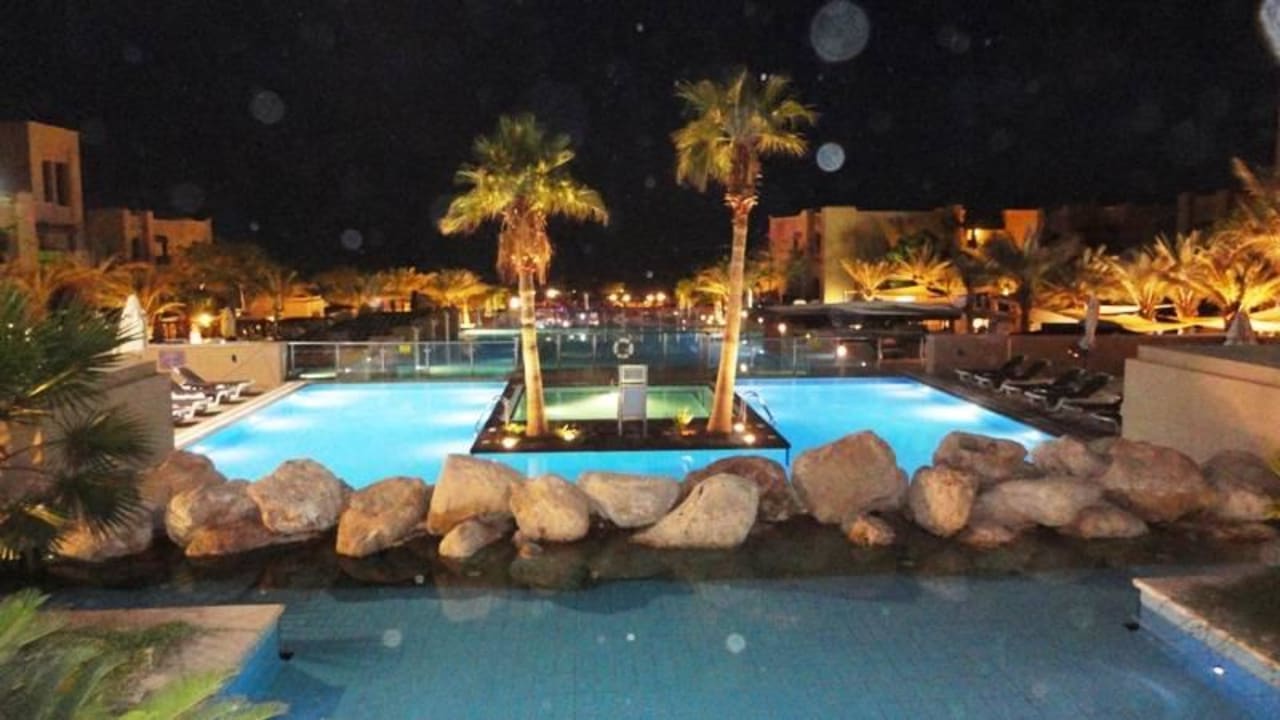 Pool at night Holiday Inn Resort Dead Sea