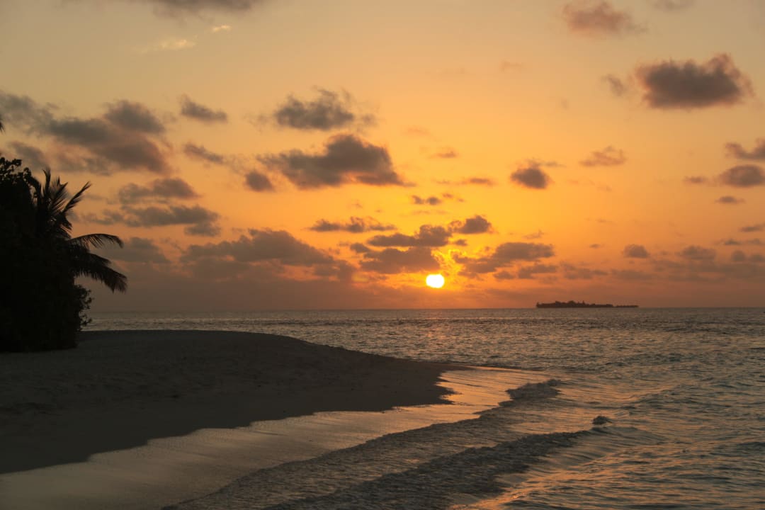 Den Sonnenuntergang geniessen Sandies Bathala Maldives