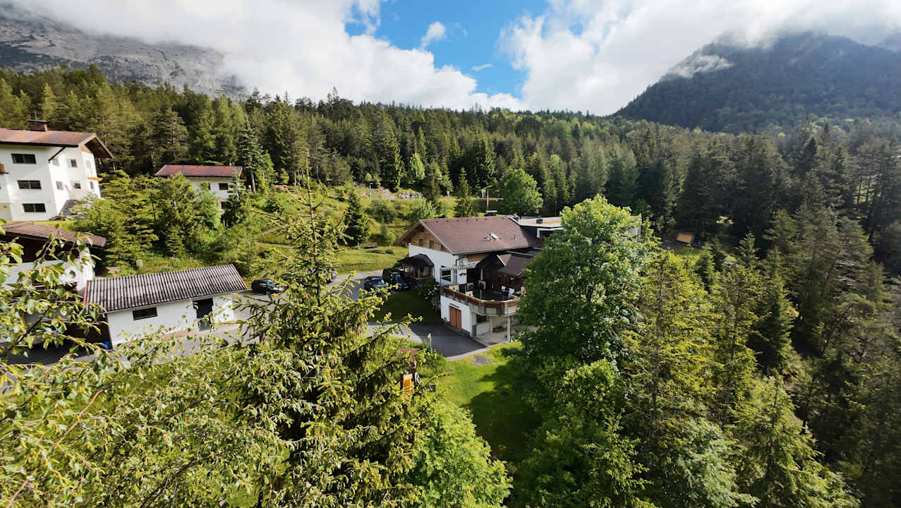 Gartenanlage Hotel Garni Isarlodge Wiesenhof