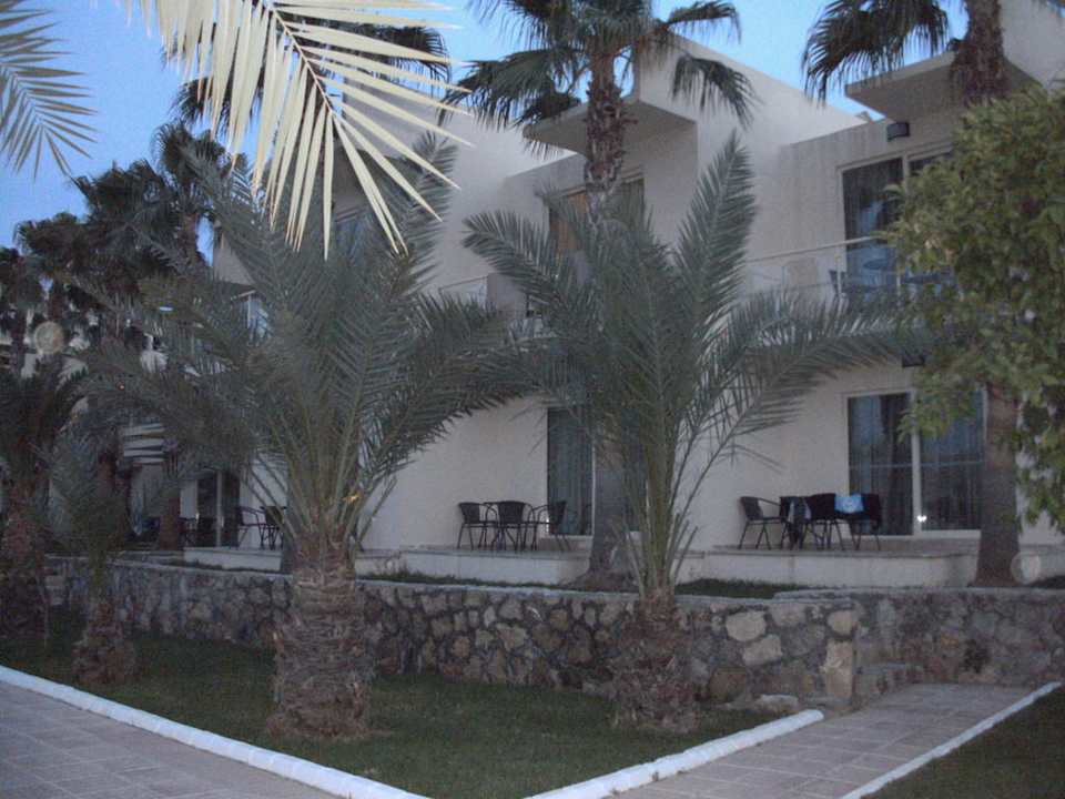 Bungalow Häuser am Abend Oscar Resort Hotel