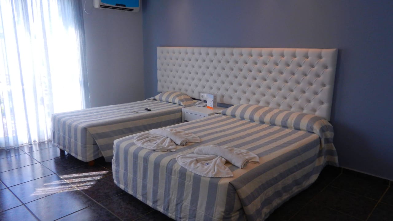 Bett im Superior Zimmer HARPIN Georgioupolis Resort Aquapark & SPA