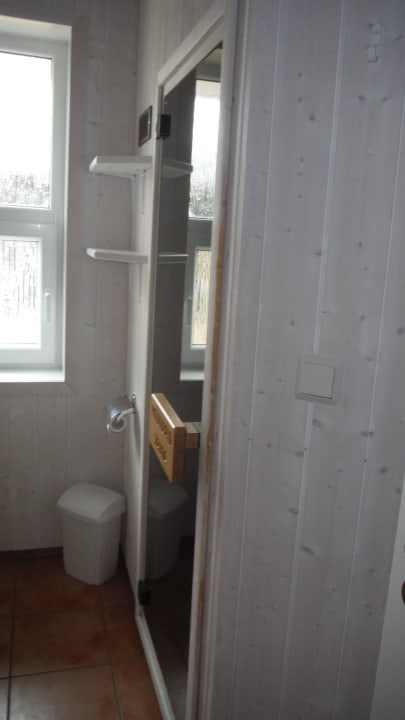 Tür zur Sauna Novasol Ferienhausdorf Tropical Insland