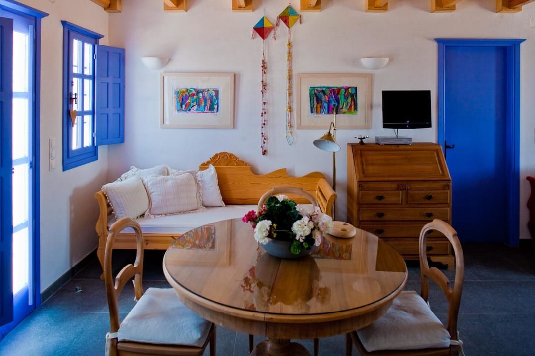 Living Room, Dining Space of 55m2 house Aegagros Caldera Houses