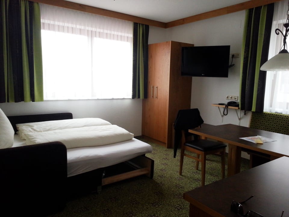 Wohnraum mit Schlafcouch Aparthotel Garni Sonnenplateau