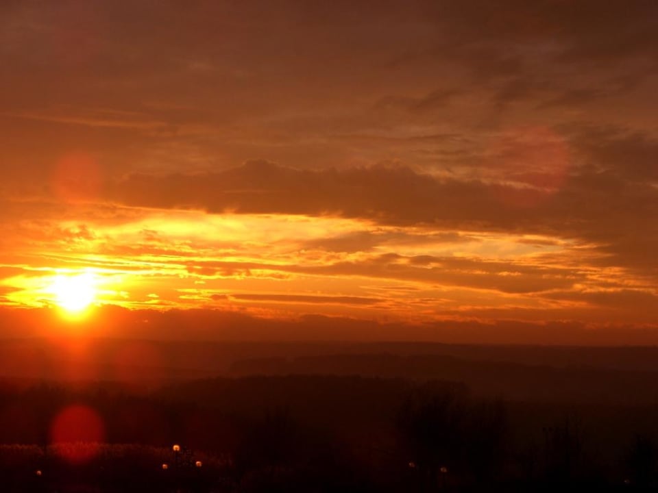 Sonnenuntergang über dem Golfplatz Reiters Finest Family Hotel